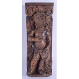 A 17TH CENTURY CONTINENTAL CARVED FRUITWOOD PUTTI PLAQUE. 24 cm x 8 cm.