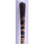 A 19TH CENTURY CARVED MULTI SECTIONAL HORN SWAGGER STICK. 80 cm long.