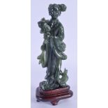 AN EARLY 20TH CENTURY CHINESE CARVED JADE FIGURE OF GUANYIN Qing/Republic. Jade 17 cm high.