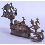 A 19TH CENTURY INDIAN PERSIA ISLAMIC BRONZE INKWELL with bird terminal. 16 cm wide.