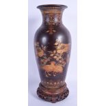 A 19TH CENTURY JAPANESE MEIJI PERIOD LACQUERED PORCELAIN VASE decorated with birds and foliage. 31 c