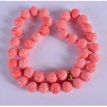 AN ART DECO CONTINENTAL CHINESE STYLE CORAL TYPE NECKLACE. 48 cm long.