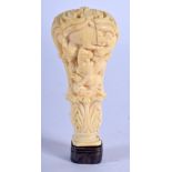 A 19TH CENTURY BAVARIAN BLACK FOREST CARVED IVORY SEAL decorated with hunting scenes. 7.5 cm high.