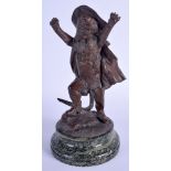 AN ANTIQUE COLD PAINTED BRONZE FIGURE OF PUSS IN BOOTS modelled with hands raised, upon a marble bas
