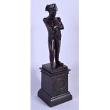 A 19TH CENTURY FRENCH BRONZE FIGURE OF NAPOLEON modelled upon a bronze pedestal. 25 cm high.