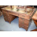 A RARE CAMPAIGN DESK with associated leather back chair. Desk 140 cm x 80 cm. (2)