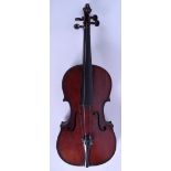 AN EARLY 20TH CENTURY SINGLE PIECE BACK CHERRY WOOD VIOLIN. 59 cm long.