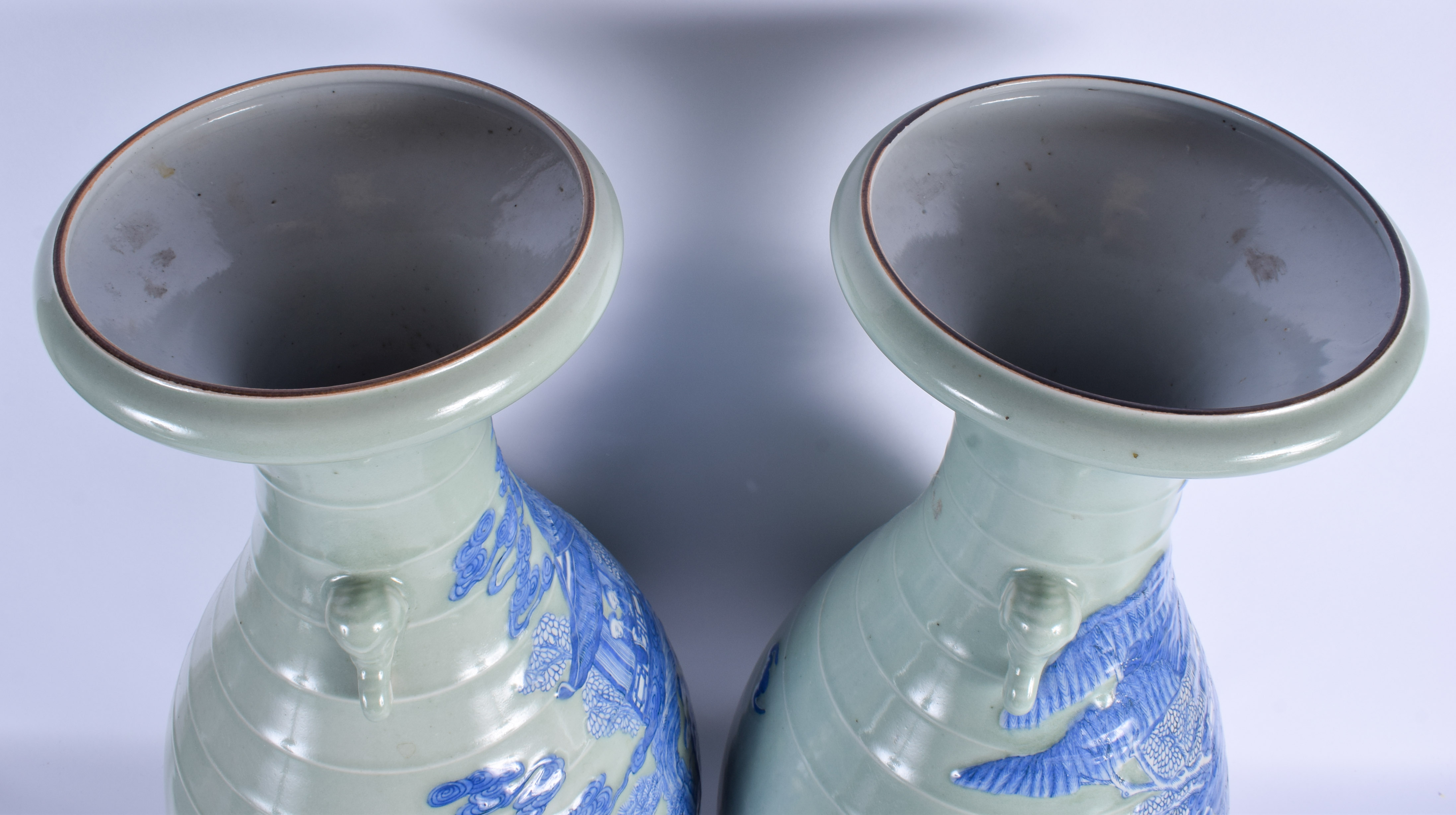 A LARGE PAIR OF 19TH CENTURY CHINESE CELADON BLUE AND WHITE VASES Late Qing, painted with figures in - Image 5 of 7