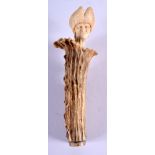 A 19TH CENTURY BAVARIAN BLACK FOREST CARVED STAG ANTLER HANDLE formed as a male wearing a hat. 10.25