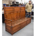 A HUGE 18TH CENTURY PROVINCIAL OAK TRIPLE BACK SETTLE with fold up seat and of fantastic colour. 129