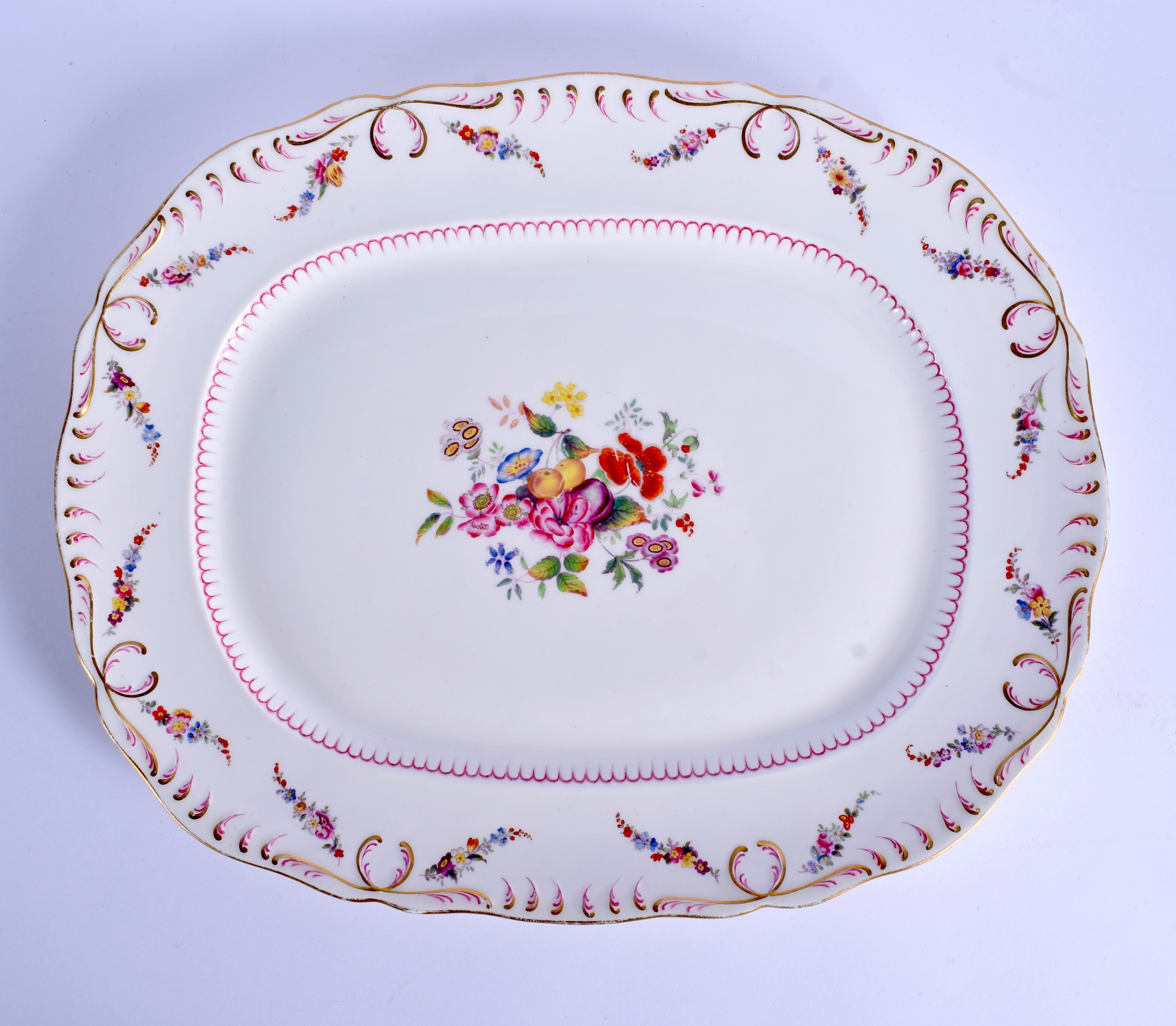 A LARGE 19TH CENTURY CONTINENTAL RECTANGULAR PLATTER decorated with flowers and trailing vines. 36 c