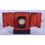 A RARE EARLY 20TH CENTURY EUROPEAN TORTOISESHELL MINIATURE CLOCK with silvered dial and black numera