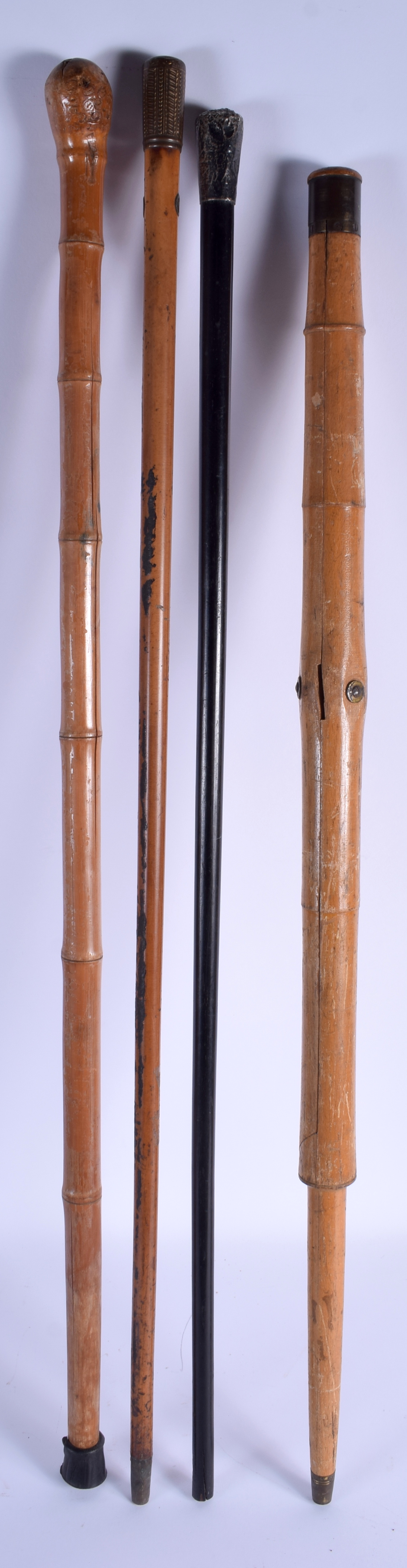 FOUR ASSORTED VINTAGE WALKING CANES including a gnurled bamboo cane. Largest 90 cm long. (4) - Image 3 of 3