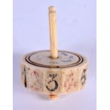 A GEORGE III BONE SPINNING GAME DICE. 6 cm x 4 cm.