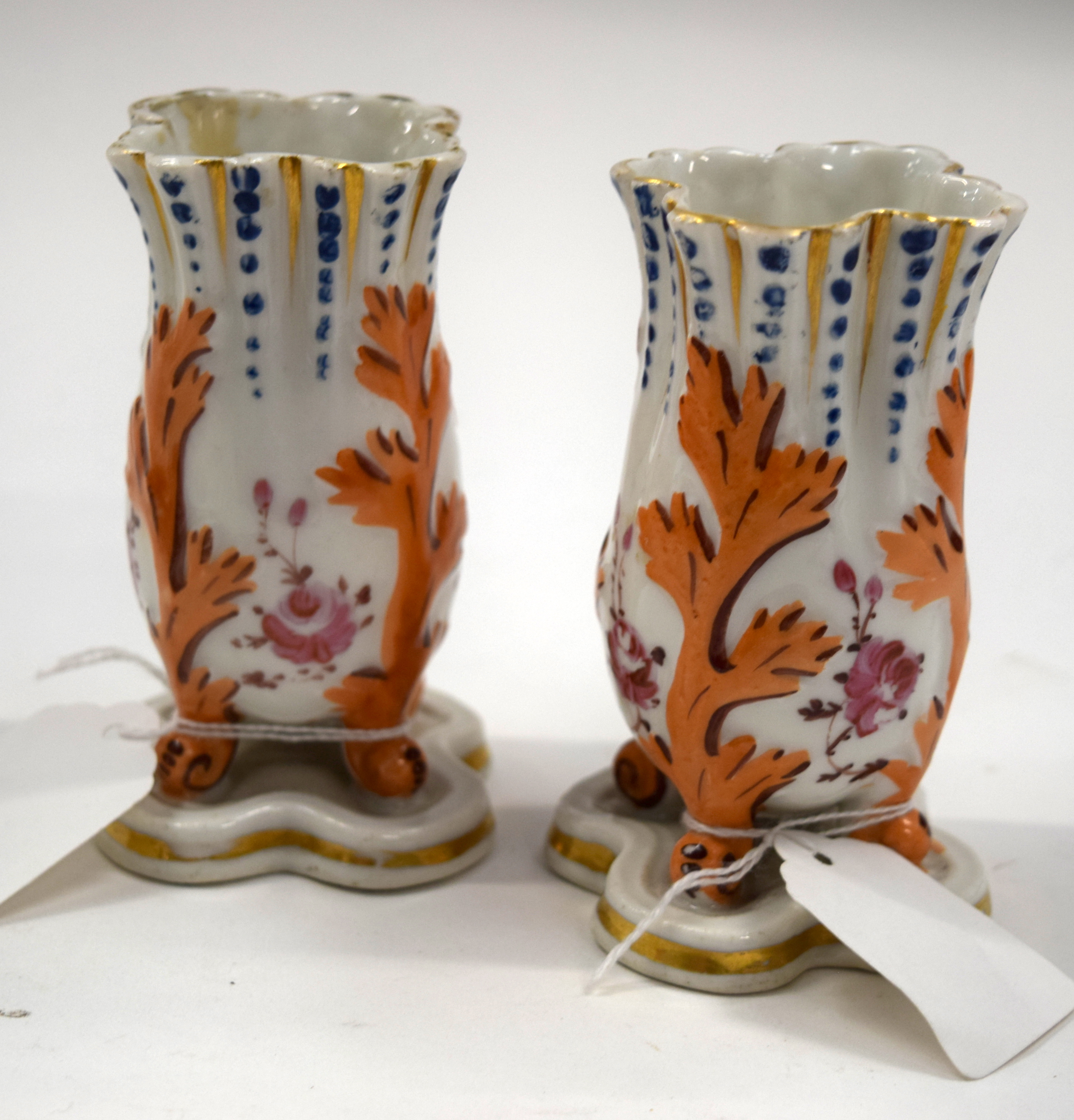 A PAIR OF ANTIQUE FRENCH PORCELAIN SPILL VASES. 12.5 cm high.