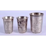 THREE ANTIQUE RUSSIAN SILVER BEAKERS. 1.7 oz. Largest 5 cm high. (3)