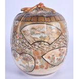 A 19TH CENTURY JAPANESE MEIJI PERIOD SATSUMA CENSER AND COVER painted with figures and landscapes. 1
