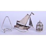 A 19TH CENTURY CONTINENTAL SILVER BOAT together with a silver stand & a silver bird cage. 2 oz. (3)