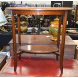 A MAHOGANY TWO TIER OCCASIONAL TABLE. 75 cm x 62 cm.