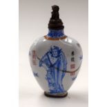 A CHINESE CANTON ENAMEL SNUFF BOTTLE. 7.5 cm high.