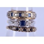 AN EDWARDIAN 18CT GOLD PLATINUM AND SAPPHIRE RING together with two other gold and silver rings. 6.8