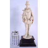 A LARGE 19TH CENTURY CONTINENTAL DIEPPE CARVED IVORY FIGURE OF A DANDY modelled in ruffled clothing.