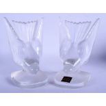 A PAIR OF FRENCH LALIQUE GLASS BOOK ENDS in the form of birds. 16 cm x 10 cm.