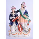 A 19TH CENTURY STAFFORDSHIRE FIGURE OF TWO TURKISH MUSICIANS depicting a Sultan & Sultane. 24 cm x 1