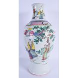 A LARGE 19TH CENTURY CHINESE FAMILLE ROSE PORCELAIN VASE Qing, painted with immortals within landsca