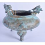 A 19TH CENTURY CHINESE TWIN HANDLED BRONZE CENSER bearing Xuande marks to base, with dragon handles.