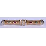 A STYLISH 1970S 14CT EMERALD AND RUBY BAR BROOCH. 5.1 grams. 5 cm wide.