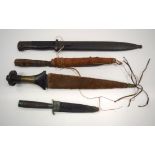 FOUR ANTIQUE KNIVES in various forms. Largest 35 cm long. (4)