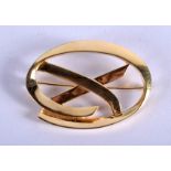 A BOXED 1980S TIFFANY & CO 18CT GOLD STYLISED BROOCH. 15.7 grams. 4.75 cm x 2.5 cm.