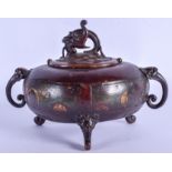 A 19TH CENTURY JAPANESE MEIJI PERIOD BRONZE AND ENAMEL CENSER AND COVER decorated with foliage. 16 c