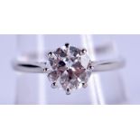 A LOVELY PLATINUM AND 1.56 CT DIAMOND BRILLIANT CUT RING with AGI report. 3.3 grams. R/S.