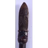 A 19TH CENTURY NEW ZEALAND TRIBAL MAORI CARVED WOOD STAFF Tiaha, engraved with foliage and motifs. 1