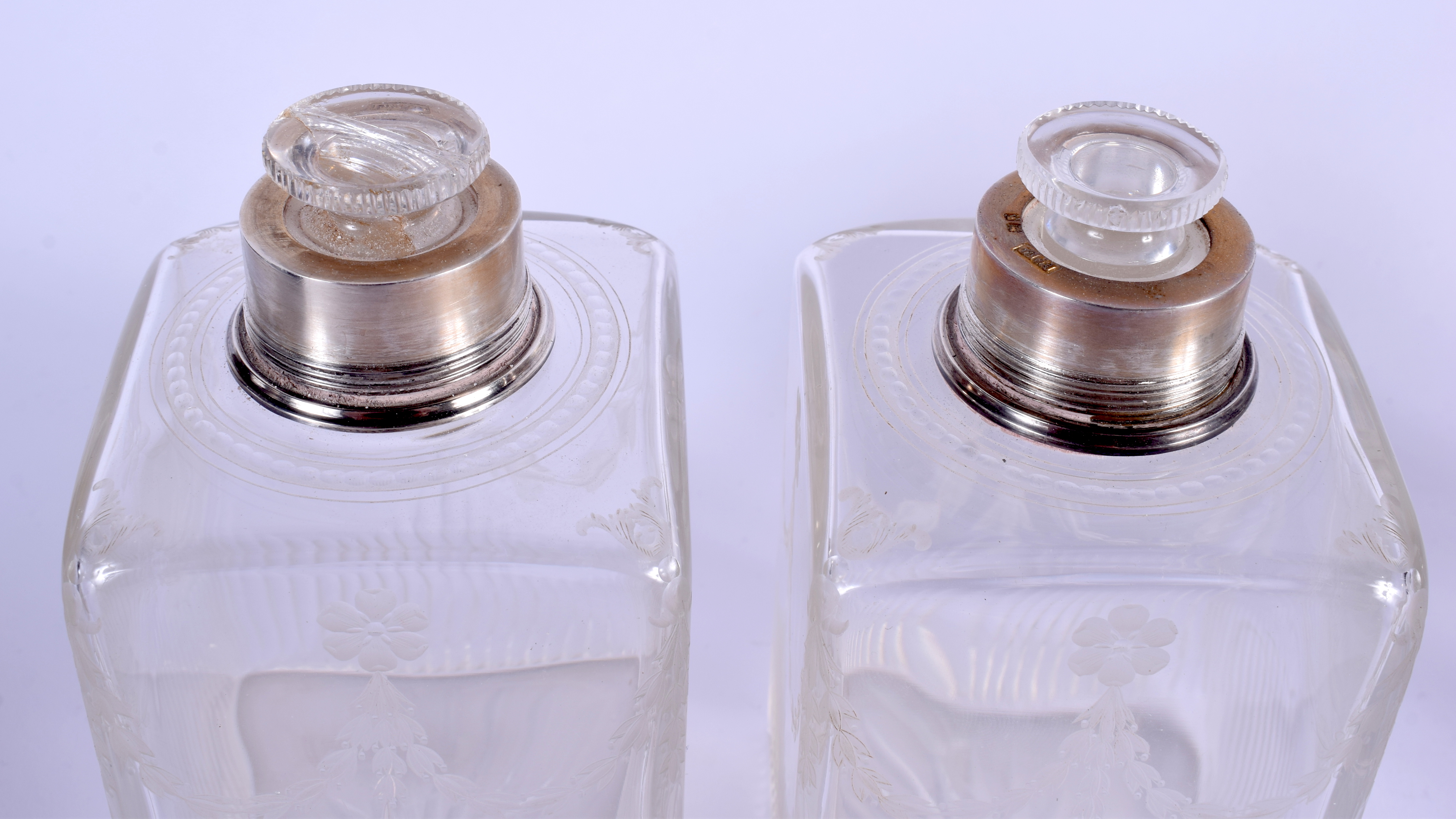 A SET OF THREE EDWARDIAN NEO CLASSICAL SILVER TOPPED BOTTLES. London 1916. Largest 16.5 cm high. (3) - Image 5 of 5