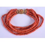 A CONTINENTAL 18CT GOLD AND CORAL NECKLACE. 307 grams. Each strand 40 cm long, largest bead 0.6 cm x