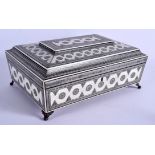A GOOD 19TH CENTURY ANGLO INDIAN CARVED IVORY VIZAGAPATAM WORK BOX decorated with geometric motifs.