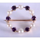 A VINTAGE 9CT GOLD AMETHYST AND PEARL BROOCH. 3.8 grams. 3.25 cm wide.