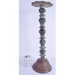 A LARGE ISLAMIC MIDDLE EASTERN COPPER ALLOY CANDLESTICKS decorated with Kufic script etc. 60 cm x 14