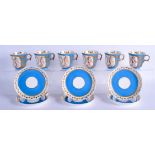 A SET OF SIX LATE 19TH CENTURY FRENCH POWDER BLUE PORCELAIN CUPS AND SAUCERS painted with putti amon