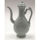 A CHINESE PALE BLUE GROUND EWER AND COVER. 22 cm high.