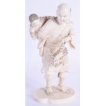 A 19TH CENTURY JAPANESE MEIJI PERIOD CARVED IVORY OKIMONO modelled as a male holding a crab. 16.5 cm