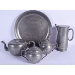 A RARE 19TH CENTURY CHINESE HUIKEE SWATOW FOUR PIECE PEWTER TEASET with matching dragon tray. Tray 2