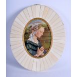 A LARGE 1920S CARVED IVORY SUNBURST FRAME containing a portrait miniature. 25 cm x 30 cm.