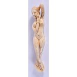 A 19TH CENTURY CHINESE CARVED IVORY MEDICINE DOLL Qing, modelled as a nude lady. 10 cm x 2 cm.