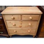 A VINTAGE PINE CHEST OF DRAWERS. 91 cm x 82 cm.