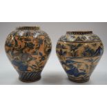 A LARGE PAIR OF ANTIQUE PERSIAN VASES painted with figures. 29 cm & 27 cm high.