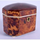 A REGENCY CARVED TORTOISESHELL TEA CADDY AND COVER with turned bun feet. 11.5 cm x 8 cm.